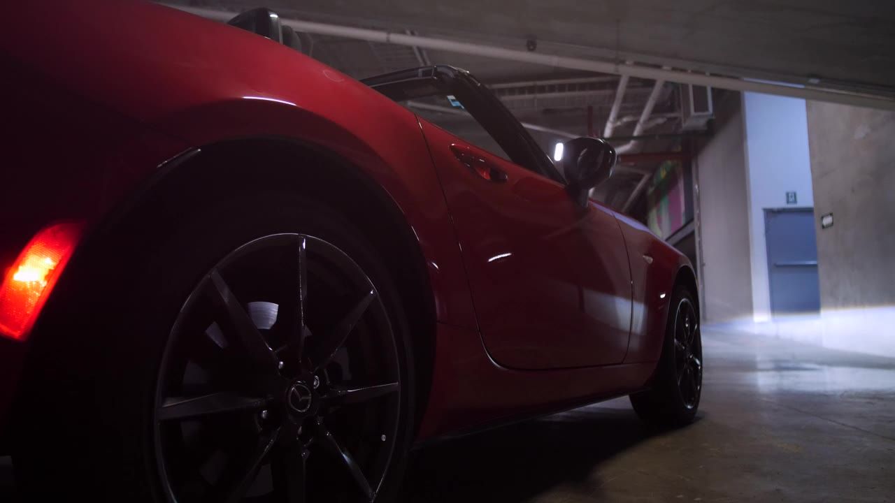 mixkit-red-sports-car-74-hd-ready